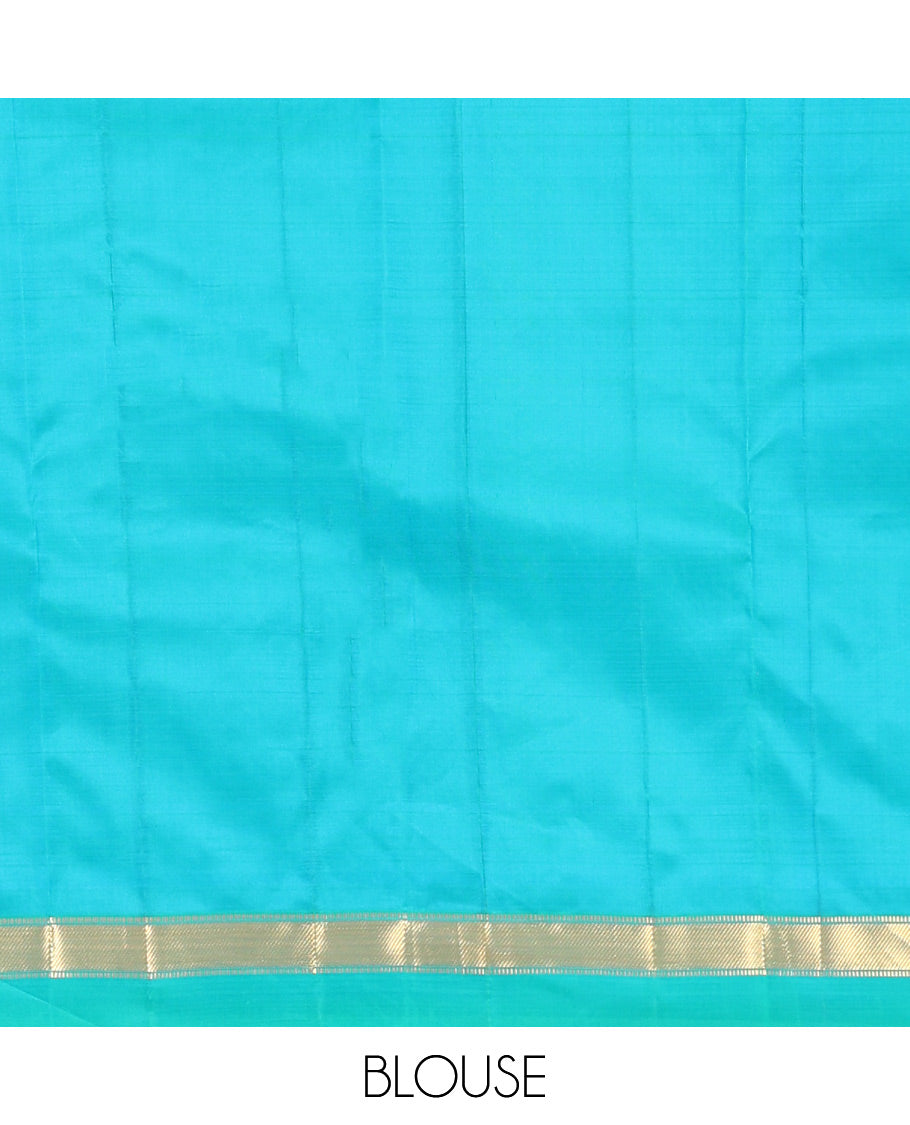 Blue Vasundhara Silk Saree, Subtly Sparkled with Zari Buttas, a Kal Eragina Border of Muthu Designs, Geometric Patterned Pallu, and a Matching Blouse