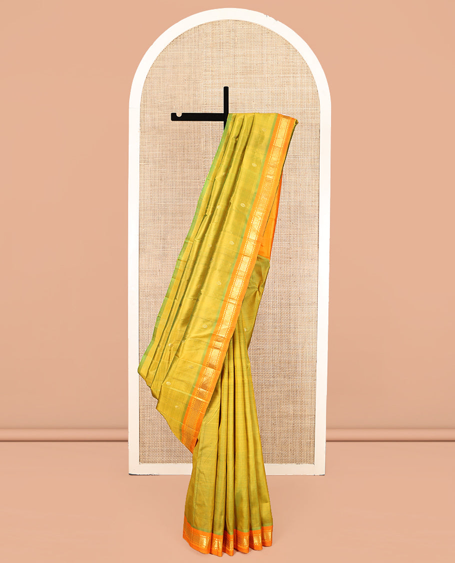 Green Kanchipuram Silk Saree, Delicately Woven with Zari Buttas, Complemented by a Contrast One-Sided Border of Rekku, and Mayil Kann Designs, Zari Design Pallu, and No Blouse