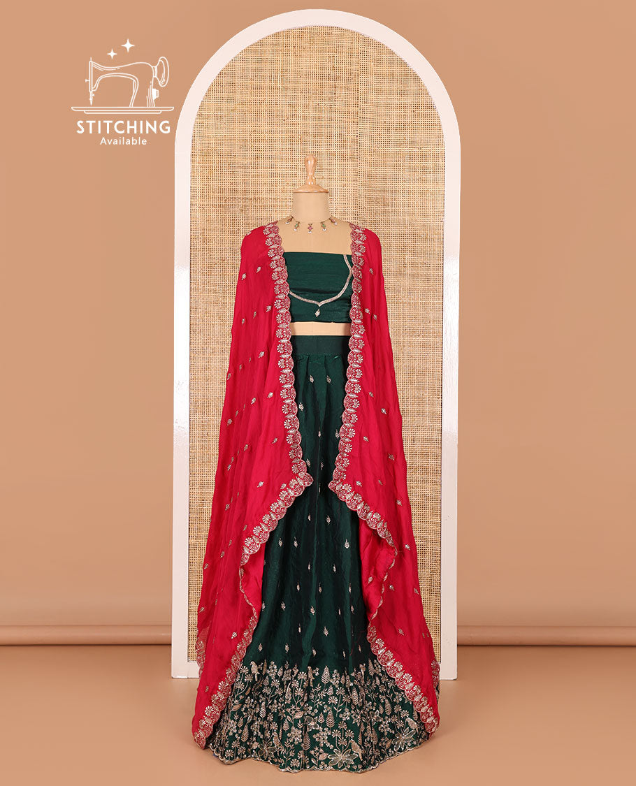 Green half-saree, floral and bird motifs embroidered velvet organza top, matching embroidered blouse, and contrast scallop embroidered syska georgette dhavani