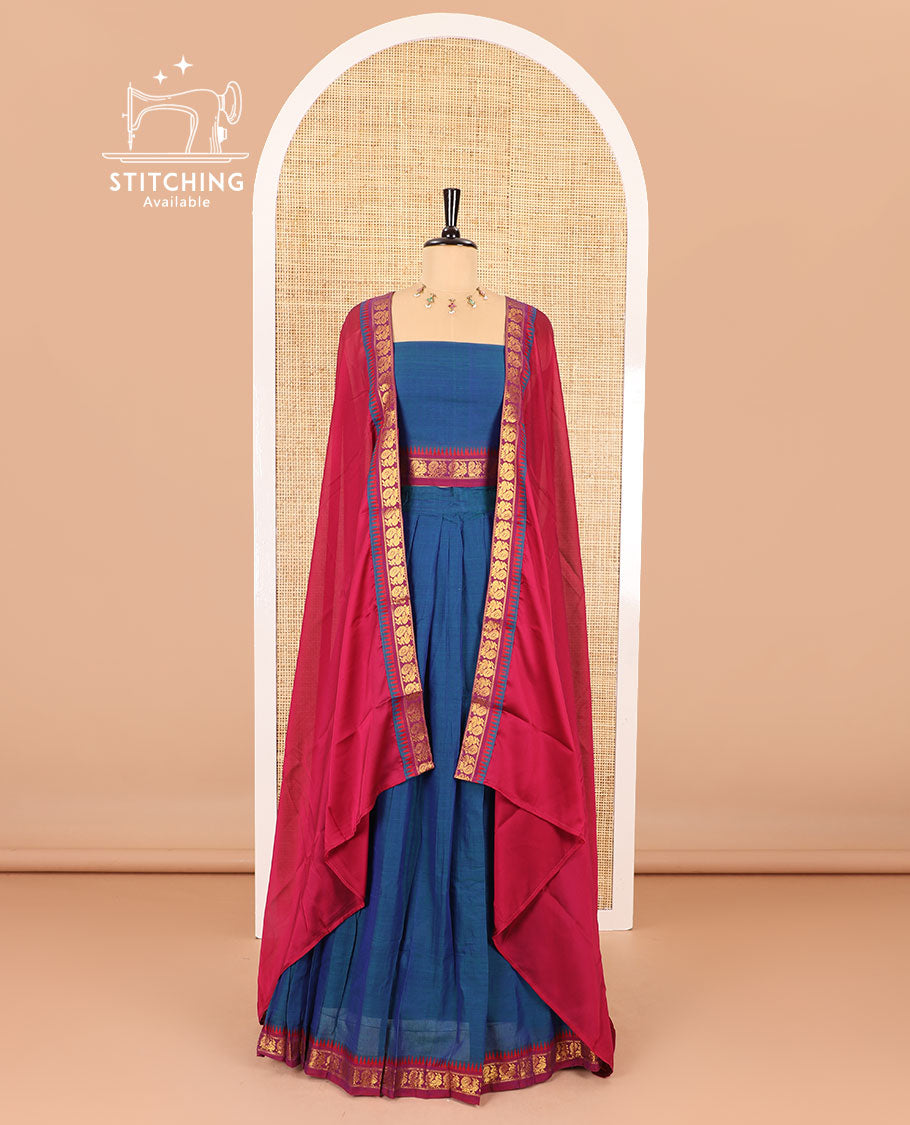 Blue half saree, plain with contrast zari peacock motifs bordered skirt, matching blouse and a contrast peacock border dhavani