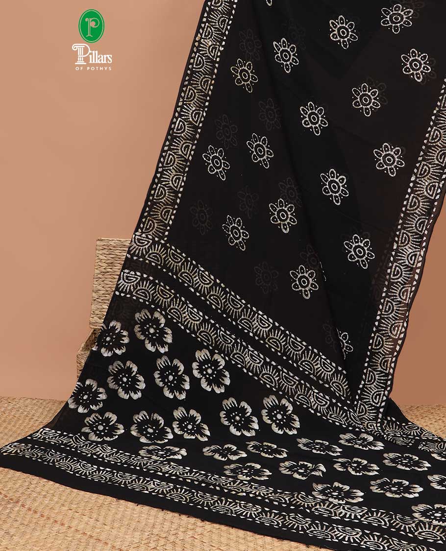 Black pathink print georgette saree with pathink print pallu & running blouse
