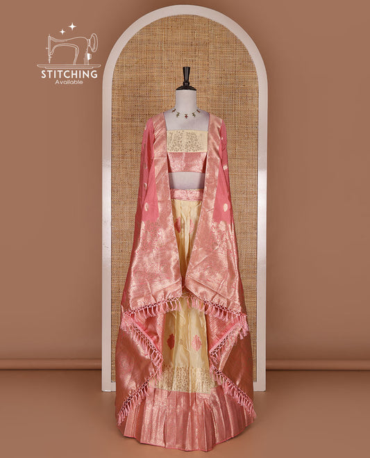 Cream taffeta silk half saree, meena buttas skirt, contrast pink traditional zari border, matching blouse, and zari woven dhavani