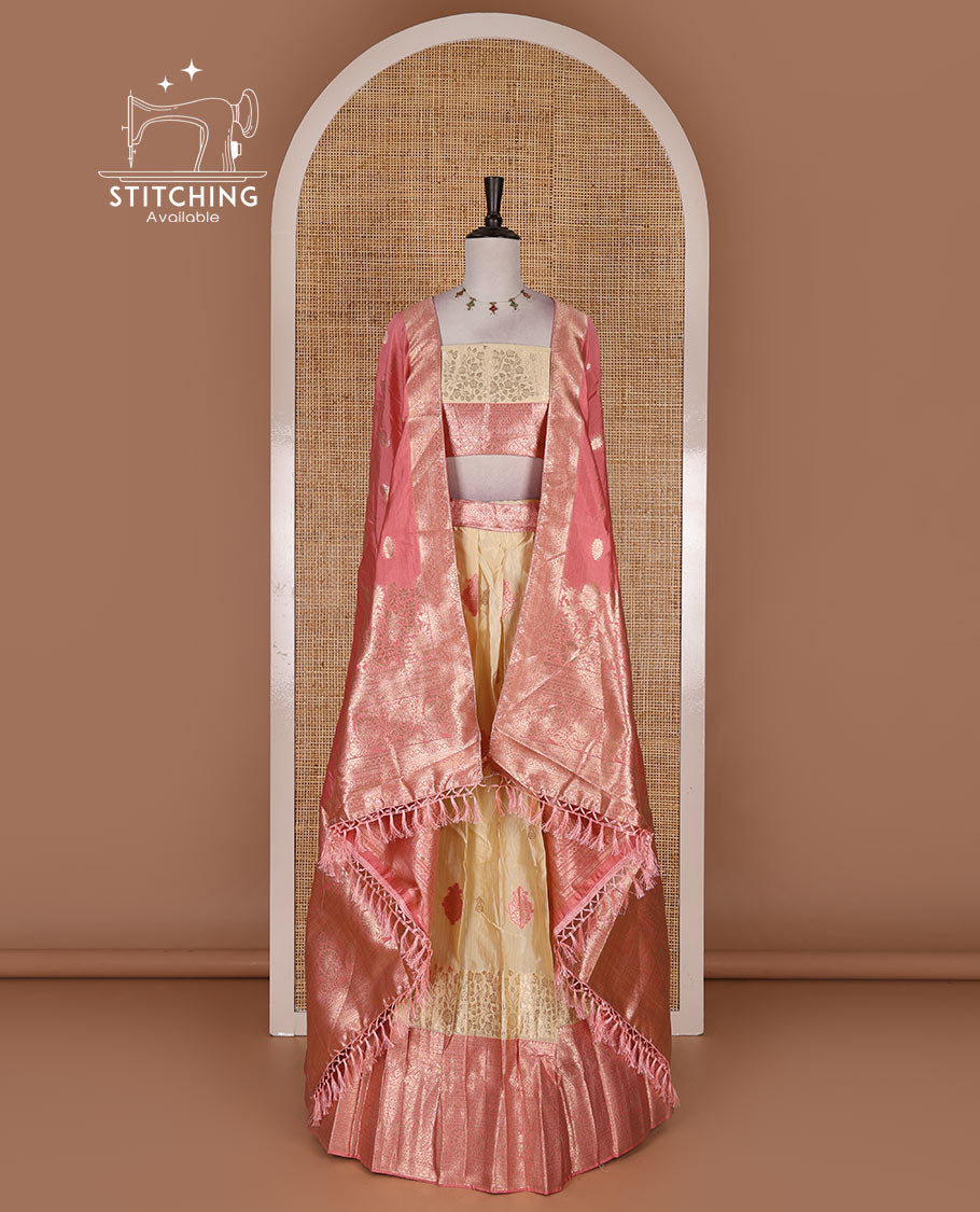Cream taffeta silk half saree, meena buttas skirt, contrast pink traditional zari border, matching blouse, and zari woven dhavani