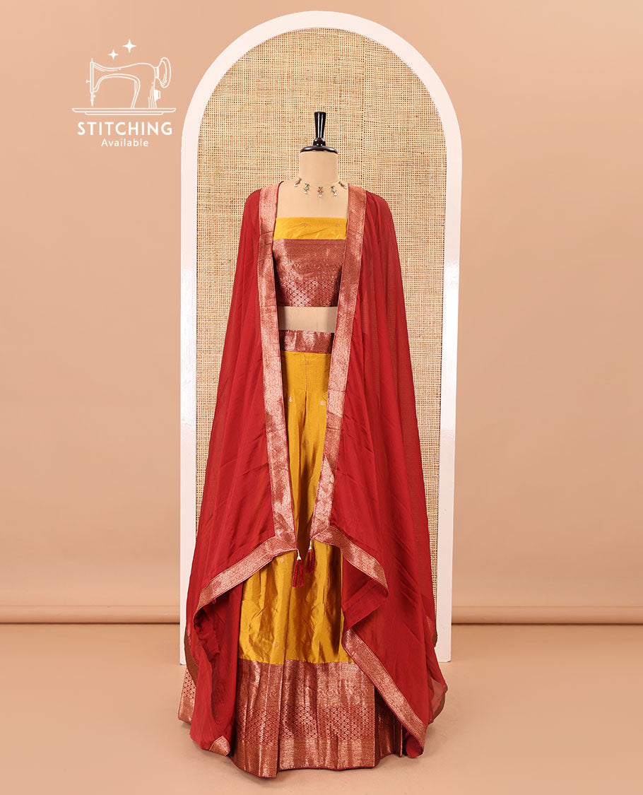 Mustard-maroon taffeta half-saree, zari buttas with contrast traditional zari bordered skirt, a matching blouse, and contrast zari border dhavani with belt