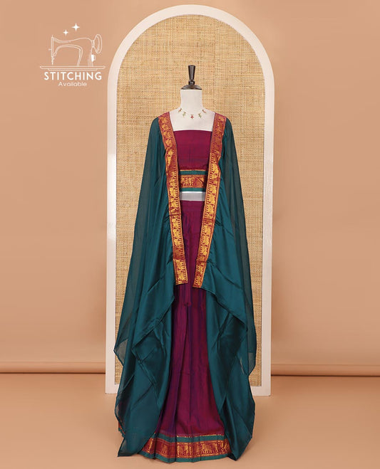 Violet mercedised cotton half-saree, plain contrast elephant zari border skirt, matching blouse & contrast green zari elephant border dhavani