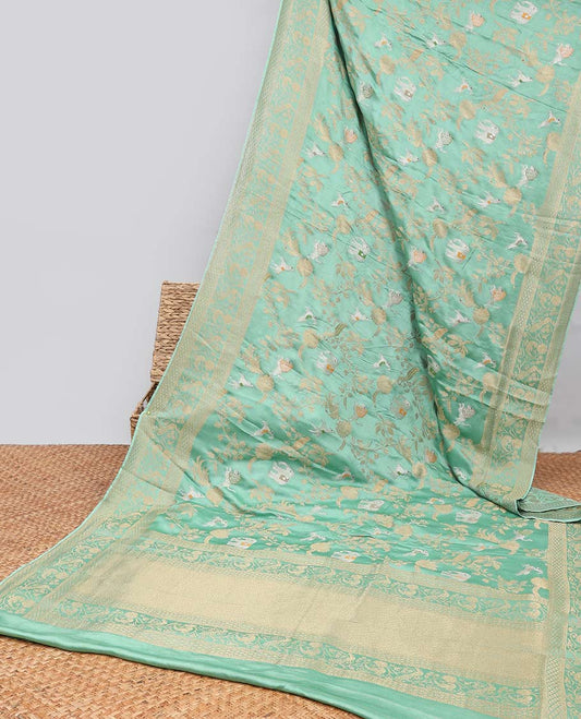 Green floral vine , animal design mushru silk saree with self-zari floral border & floral zari pallu