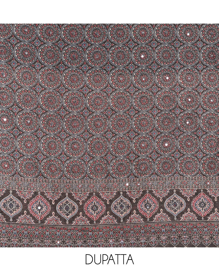 Black material chudidar set, plain Vichitra silk top, santoon bottom, and dupatta of Ajrakh print and mirror work