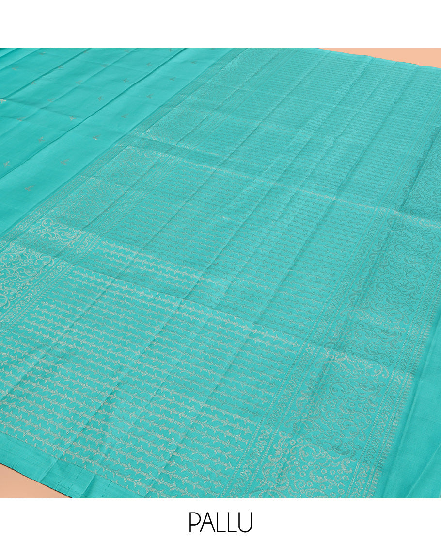 Borderless Blue Mayuri Soft Silk Saree, Subtly Woven with Buttas All Over Its Body, Highlighted by Pallu of Sparsely Woven Designs, and Paired with a Matching Blouse