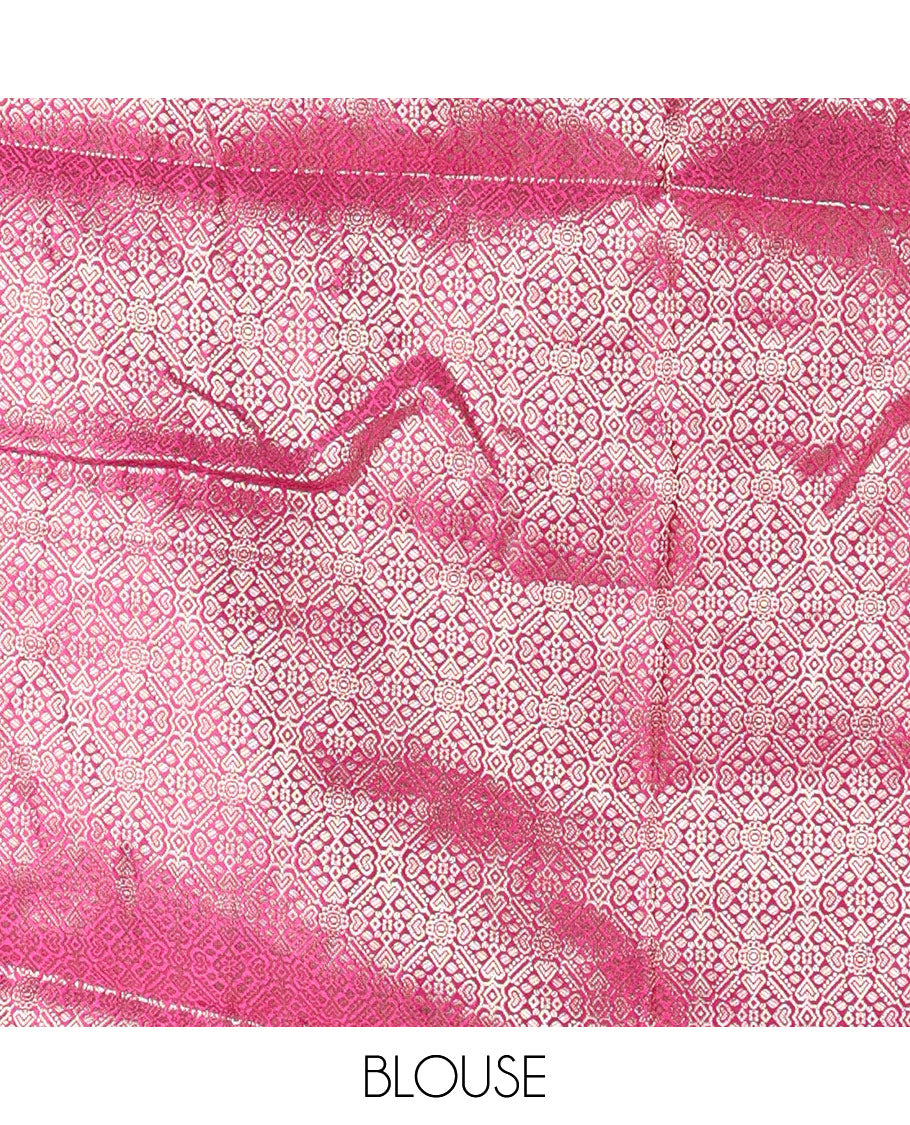 Cream with magenta semi-banarasi half-saree, zari buttas with contrast traditional zari border skirt, zari jacquard blouse, and zari design dhavani