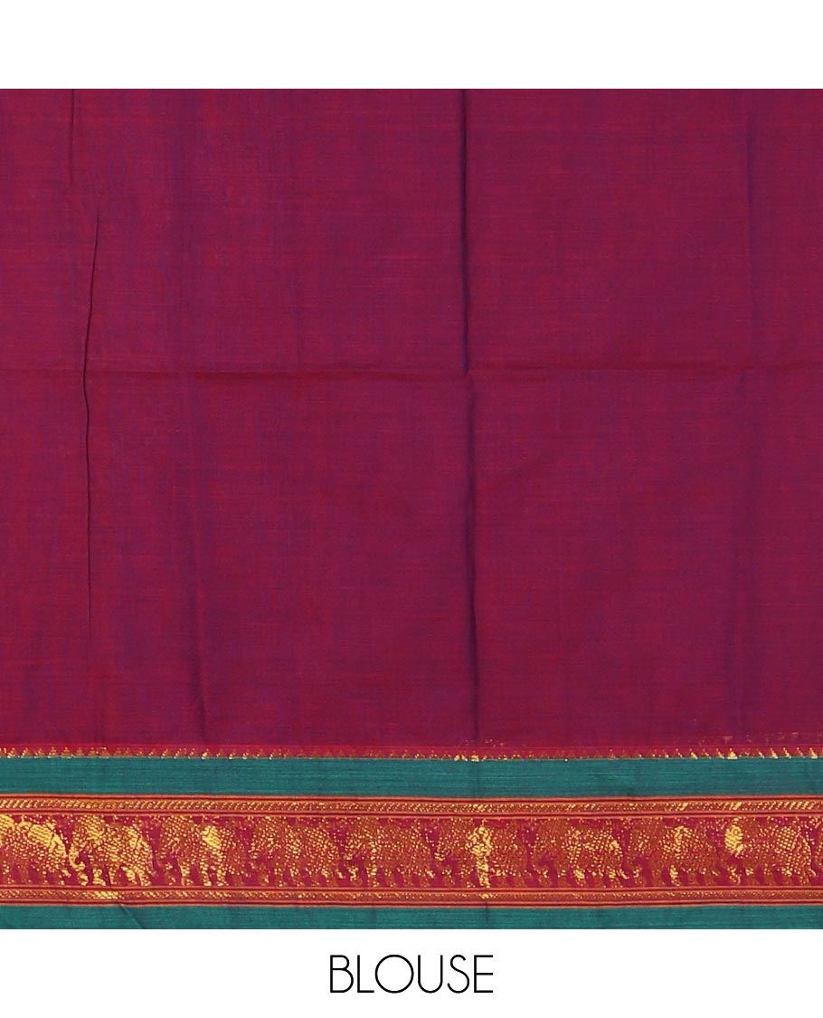 Violet mercedised cotton half-saree, plain contrast elephant zari border skirt, matching blouse & contrast green zari elephant border dhavani