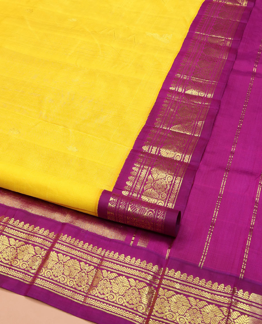 Yellow Kanchipuram Silk Saree, Mesmerized with Zari Buttas, Complemented by Contrast One-Sided Korvai Border of Banaras and Rettai Neli Designs, Pallu of Paisley and Floral Designs, and Comes Without a Blouse