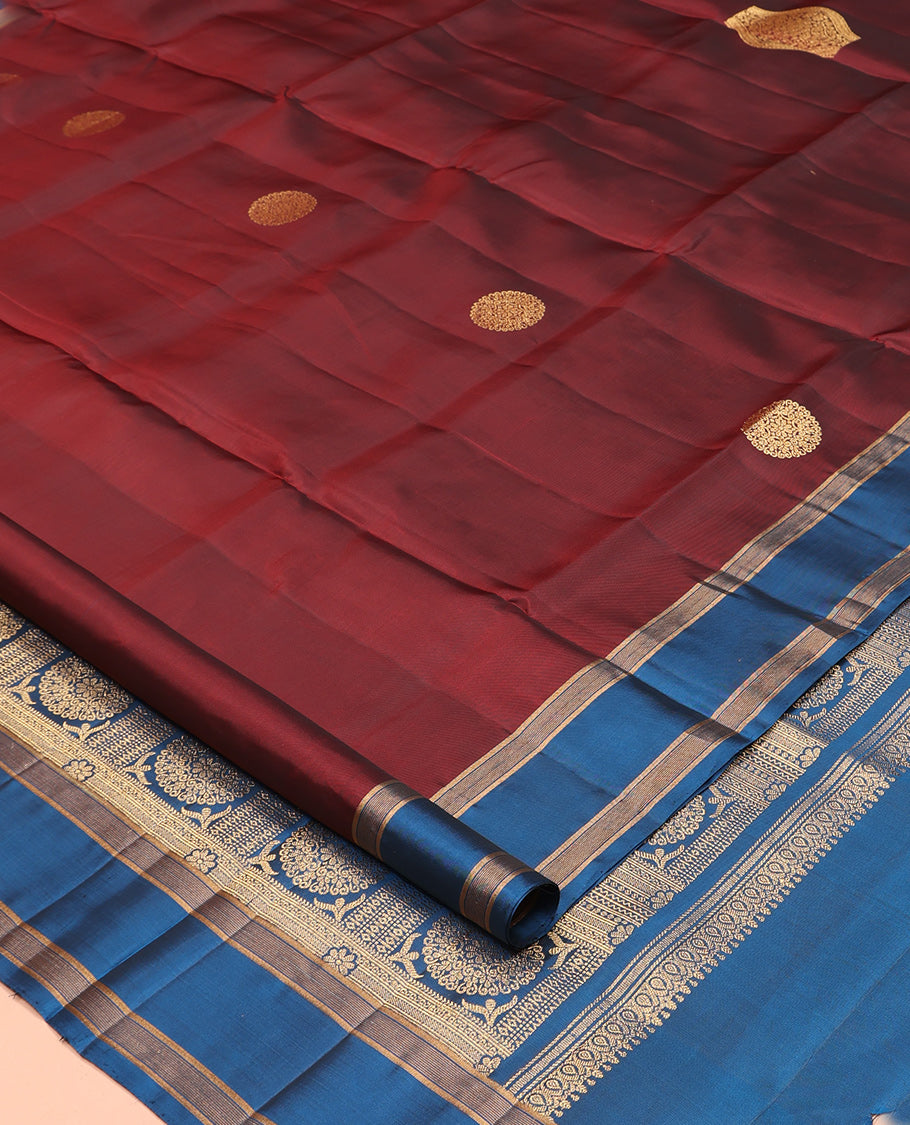 Maroon Mayuri Lite Silk Mix Saree, Gracefully Embellished with Zari Buttas, a Contrast Zari Border, Intricate Pallu, and a Contrast Blouse