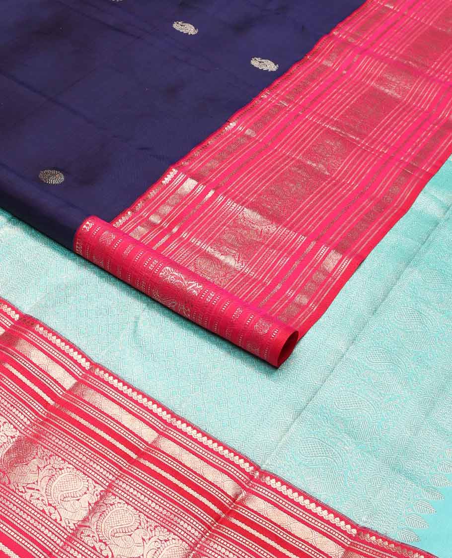 Dark blue buttas kancheepuram silk saree with contrast ganga jamuna, korvai border of thilakam mokku, muthu, banaras, mayil, manga design & zari design pallu