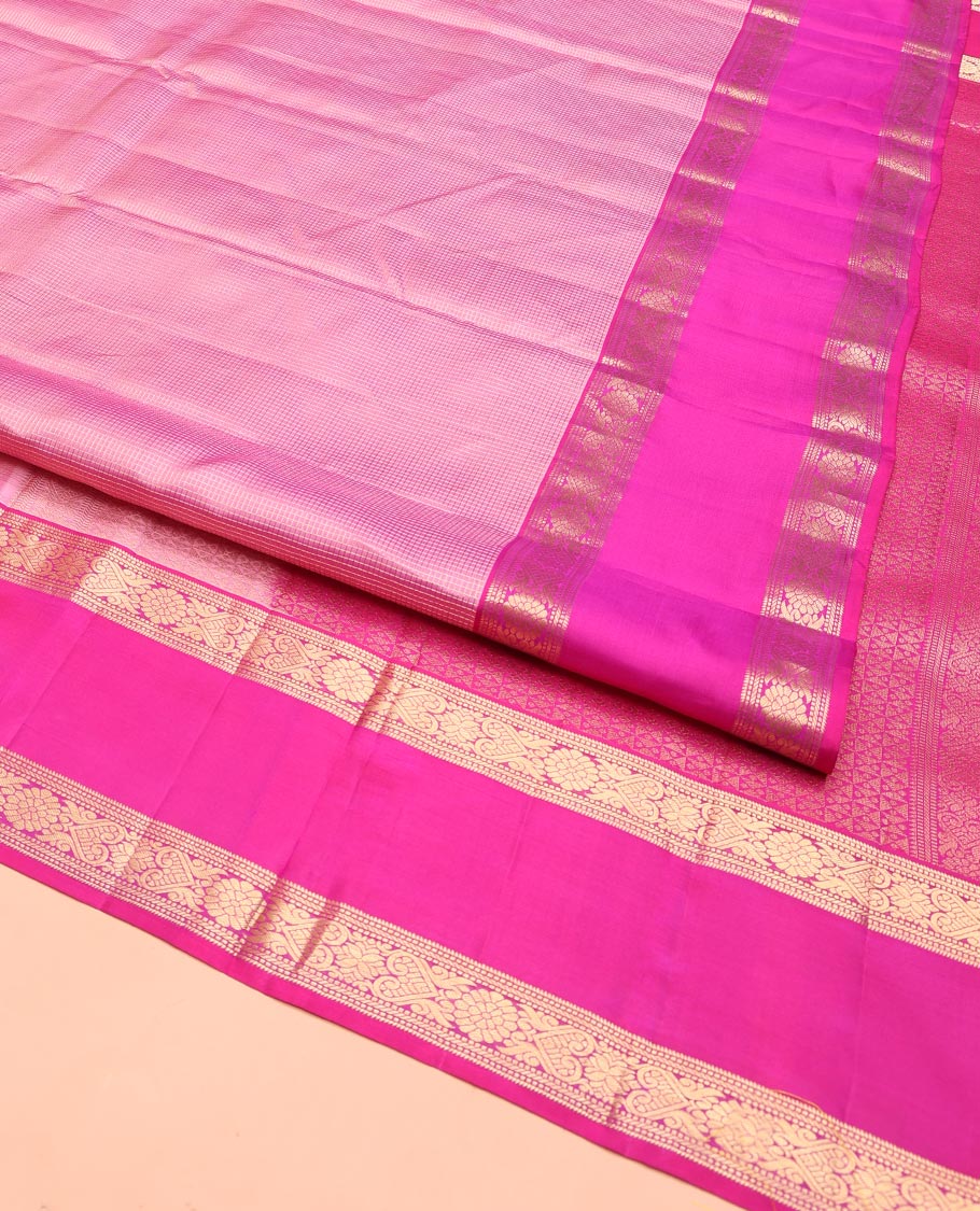 Pink Vasundhara Silk Saree, Subtly Sparkled with Micro-Checks on Its Body, Complemented by Contrast Rettai Pettu Border of Banaras, Muthu, and Jada Nagam Designs, Geometric-Patterned Pallu, and Paired with a Contrast Blouse