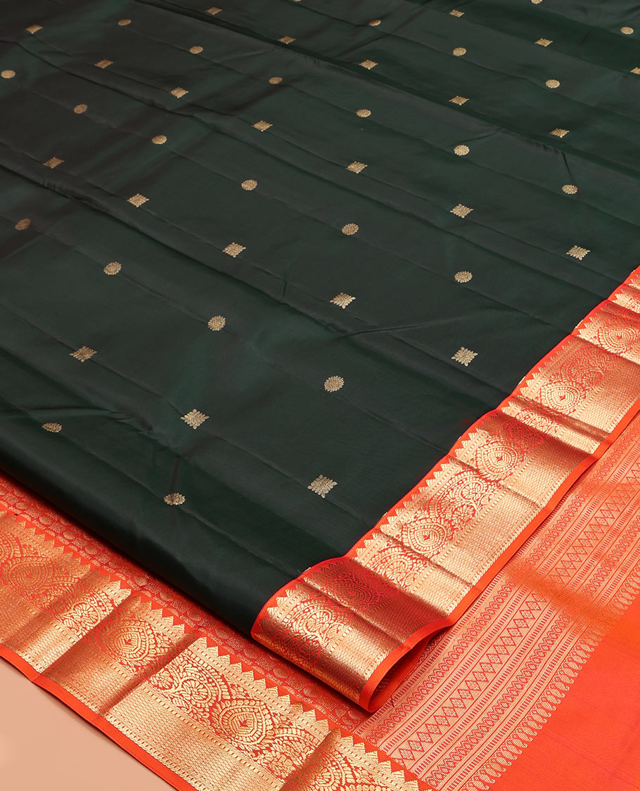 Green Vasundhara Silk Saree, Accentuated with Zari Buttas, Contrast Traditional Zari Border, Grand Pallu, and a Contrast Blouse