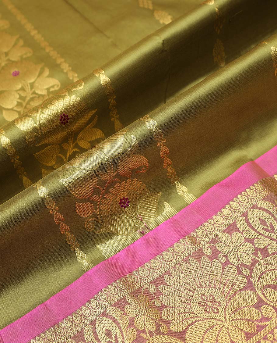 Green floral buttas pure silk half saree with contrast zari border, contrast zari design blouse & plain with zari border dhavani