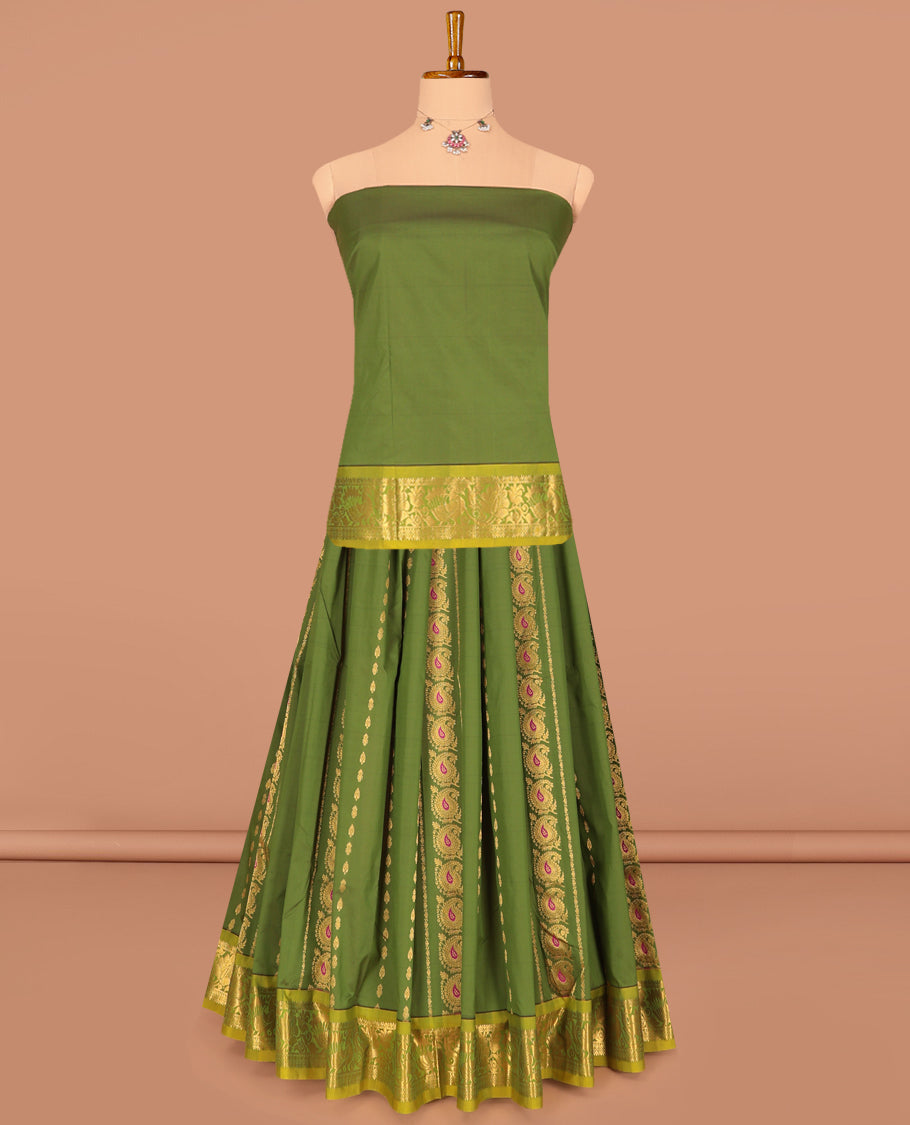Green Art Silk Pavadai Material Set Featuring Zari Designs on Its Skirt, Complemented by a Contrast Traditional Zari Border, and a Matching Blouse