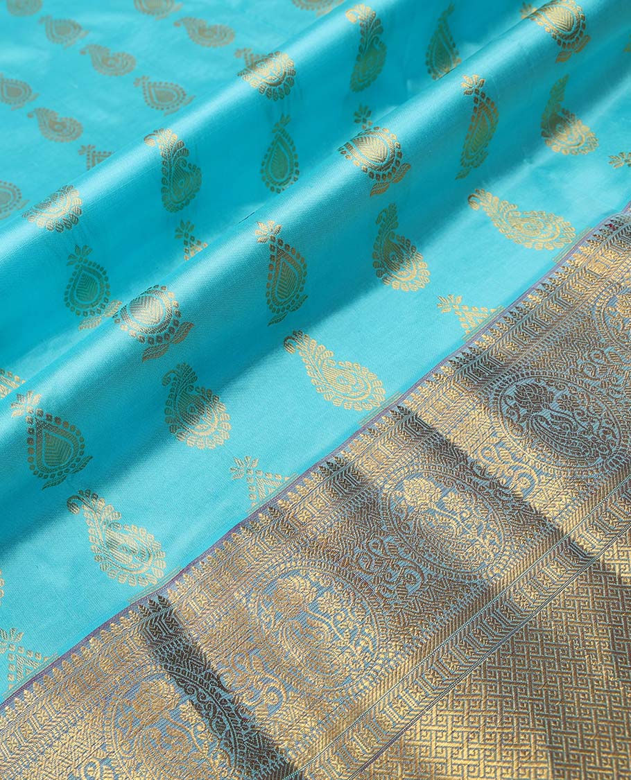 Blue leaf buttas pure silk half saree with contrast intricate zari design border, zari design blouse & floral zari design dhavani