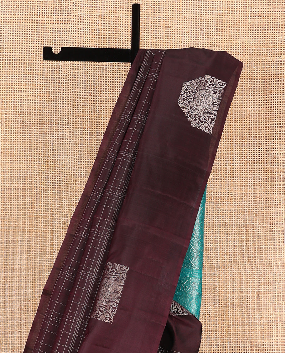Maroon muthu kattam Kanchipuram silk saree, yaanai motifs zari border, and contrast pallu of yaanai, and chakram buttas