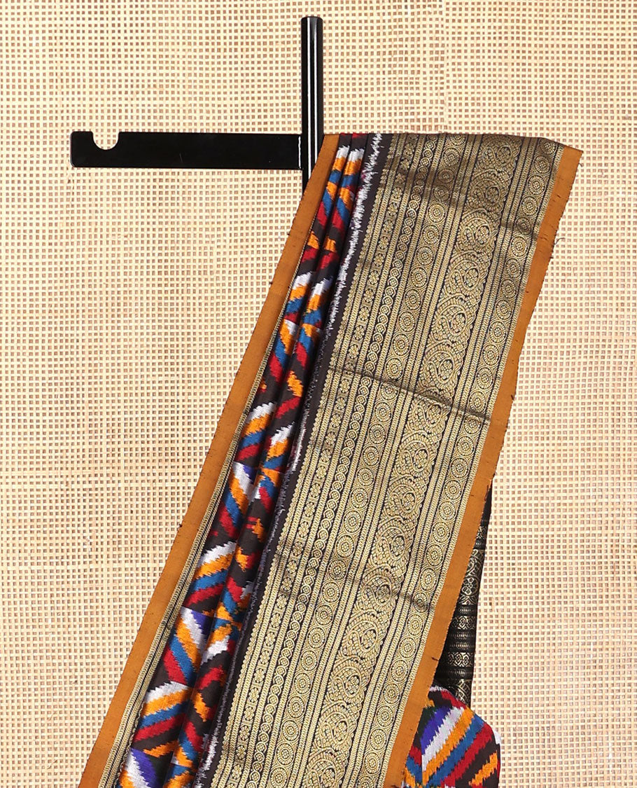 Black geometric, floral & animal design ikkat saree with contrast zari design border & traditional zari design pallu