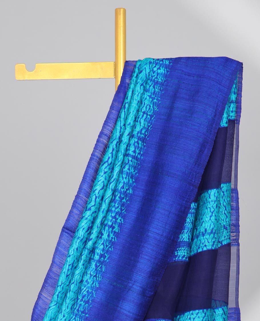Blue abstract design matka silk saree with contrast plain border & blue abstract design pallu