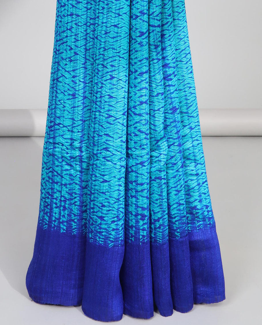Blue abstract design matka silk saree with contrast plain border & blue abstract design pallu