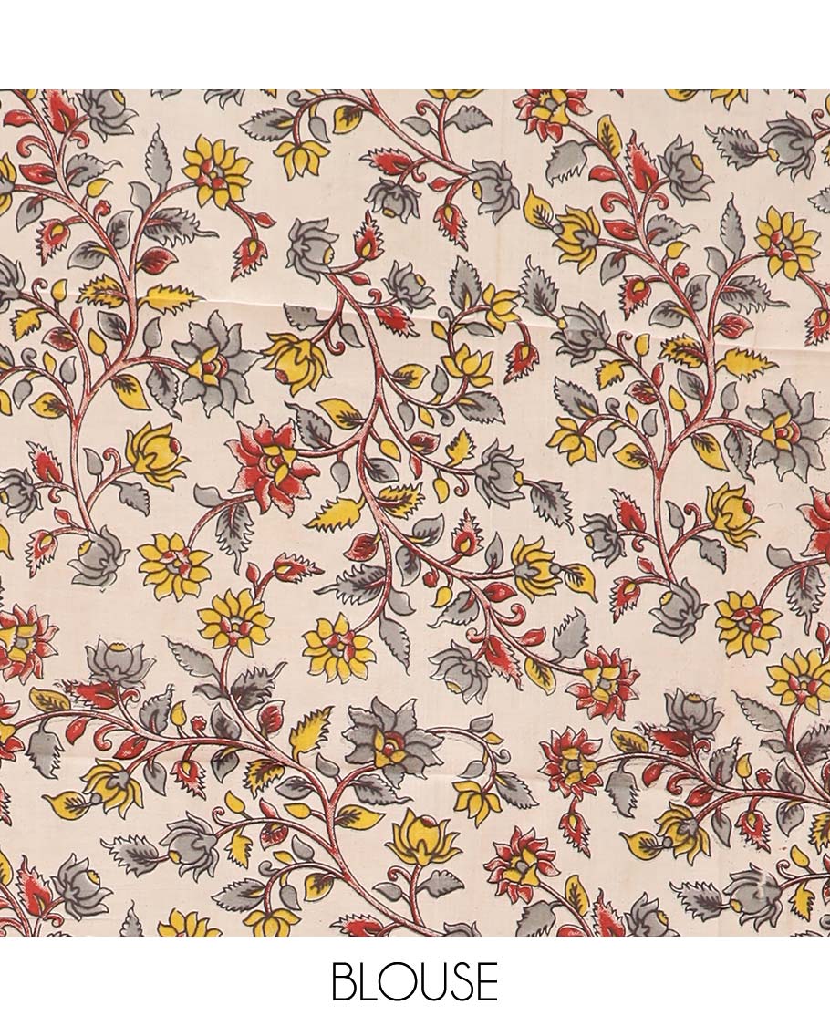 Rust orange checked Mangalagiri cotton saree, contrast striped border, striped pallu, and a contrast floral printed blouse