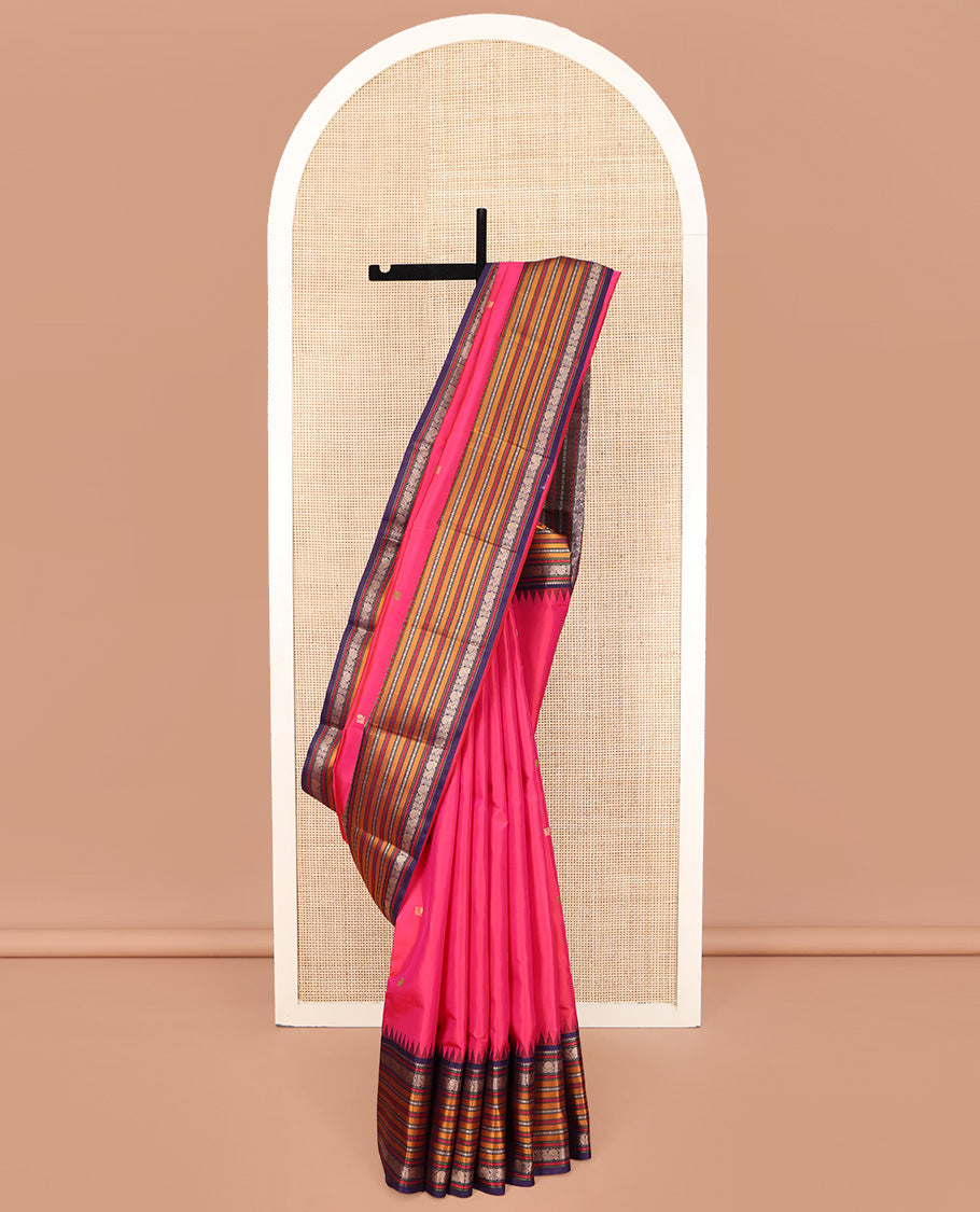 Pink Kanchipuram Silk Saree, Artfully Designed with Mayil Buttas on Its Body, Complemented by a Contrast Border of Rekku, Rudraksham, Mayil, and Kathir Designs, Pallu Steeped with Geometric Designs, and Paired with a Contrast Blouse