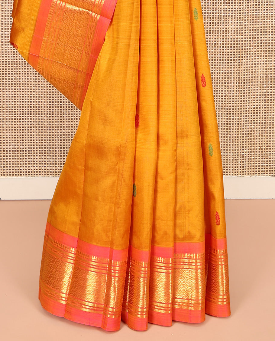 Orange Kanchipuram Silk Saree, Woven with Thread Buttas, Contrast One-Sided Border of Panner Sombu, Banaras, Muthu, and Jaal Designs, Zari Design Pallu, and No Blouse