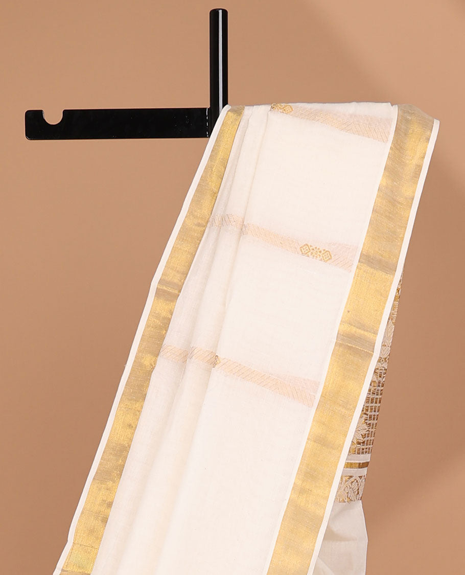 Cream kerala saree with zari stripes, zari border & pallu of floral designs in zari