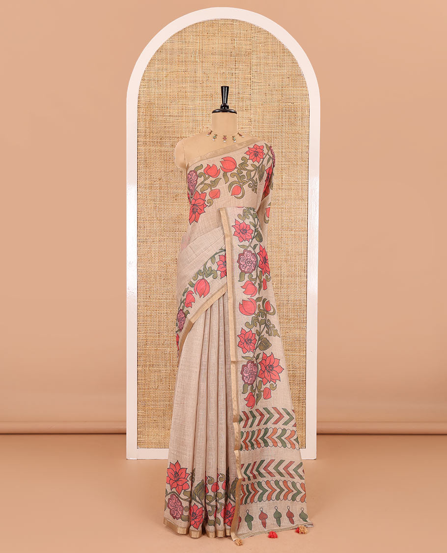 Chikku plain linen cotton saree, floral creeper printed zari piping border, geometric printed pallu, and lotus printed blouse