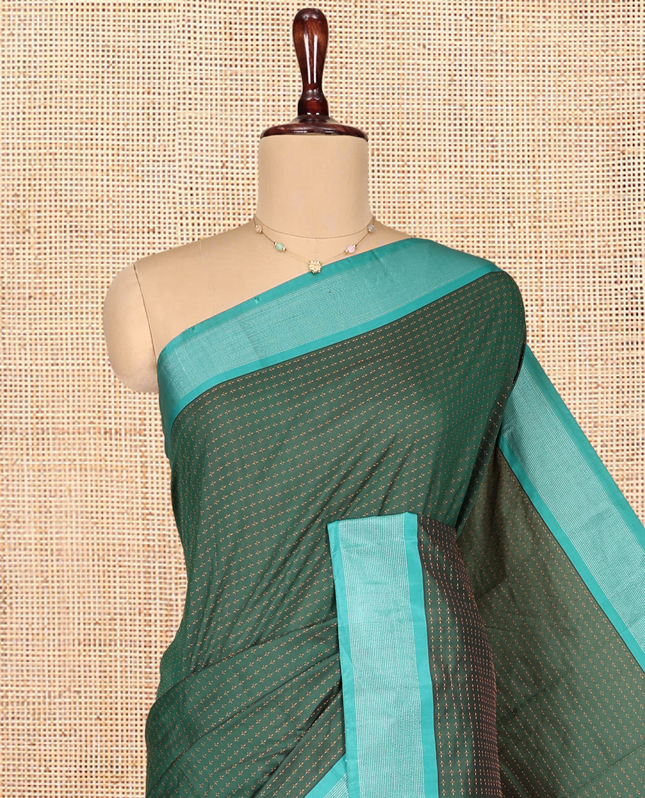 Green Aarani Gift Saree, Adorned with Plus-Shaped Buttas on Its Body, Complemented by a Contrast Striped Border, Subtle Striped Pallu, and Paired with a Matching Blouse