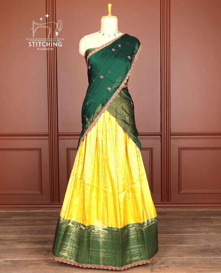 Yellow floral vine jacquard half saree with contrast intricate zari design border, zari design blouse & floral embroidery scallop border dhavani