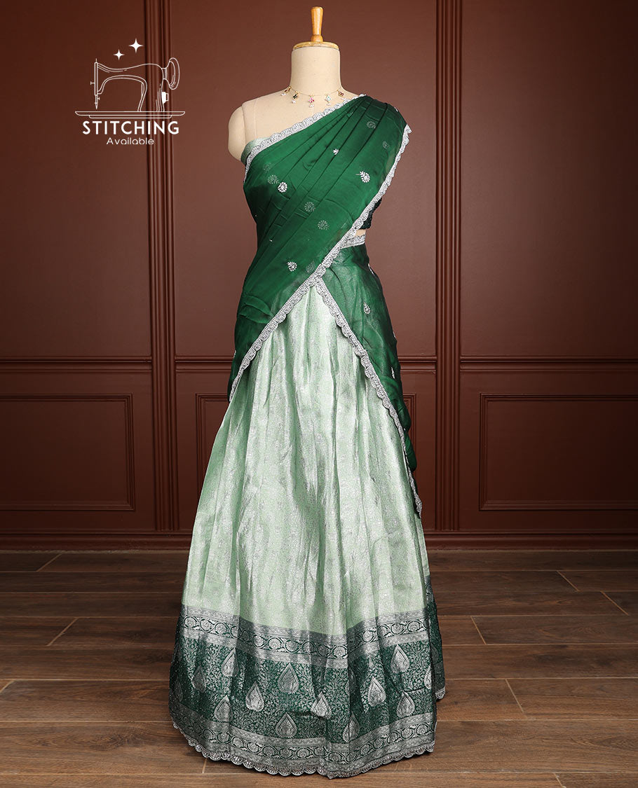 Light green floral jacquard half saree with contrast floral zari design border , zari design blouse & floral embroidery dhavani
