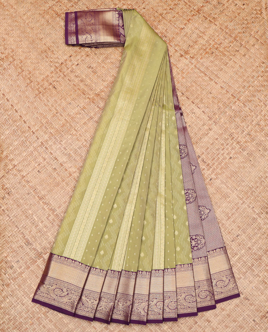 Green Budget Silk Saree, Beautifully Bedecked with Zari Buttas All Across Its Body, Complemented by a Contrast Traditional Zari Design Border, Pallu of Floral and Jaal Designs, and Paired with a Contrast Blouse