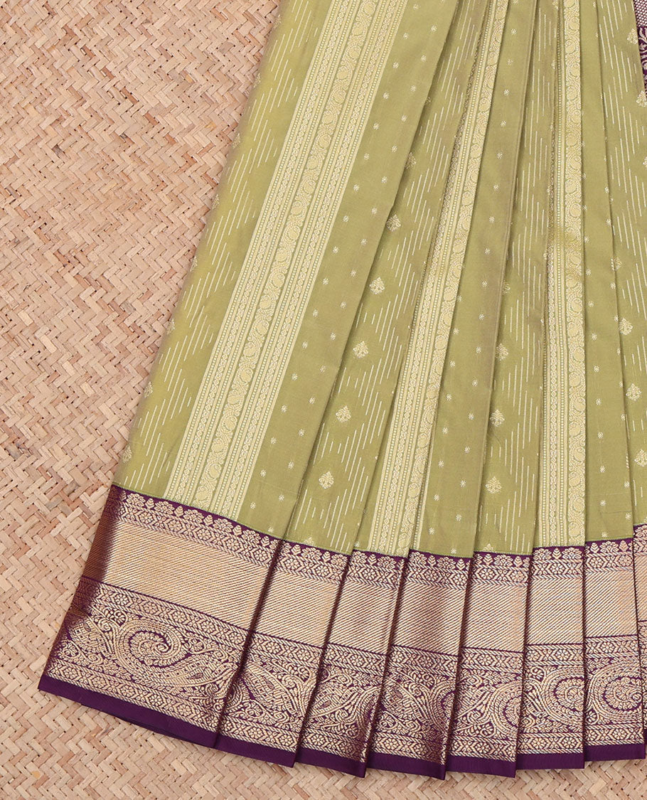 Green Budget Silk Saree, Beautifully Bedecked with Zari Buttas All Across Its Body, Complemented by a Contrast Traditional Zari Design Border, Pallu of Floral and Jaal Designs, and Paired with a Contrast Blouse