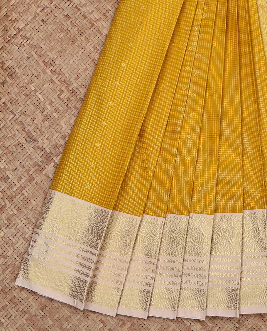 Yellow Budget Silk Saree, Sparsely Woven with Zari Buttas and Zari Checked on Its Body, Complemented by a Contrast Traditional Zari Design Border, Grand Pallu, and Paired with a Contrast Blouse