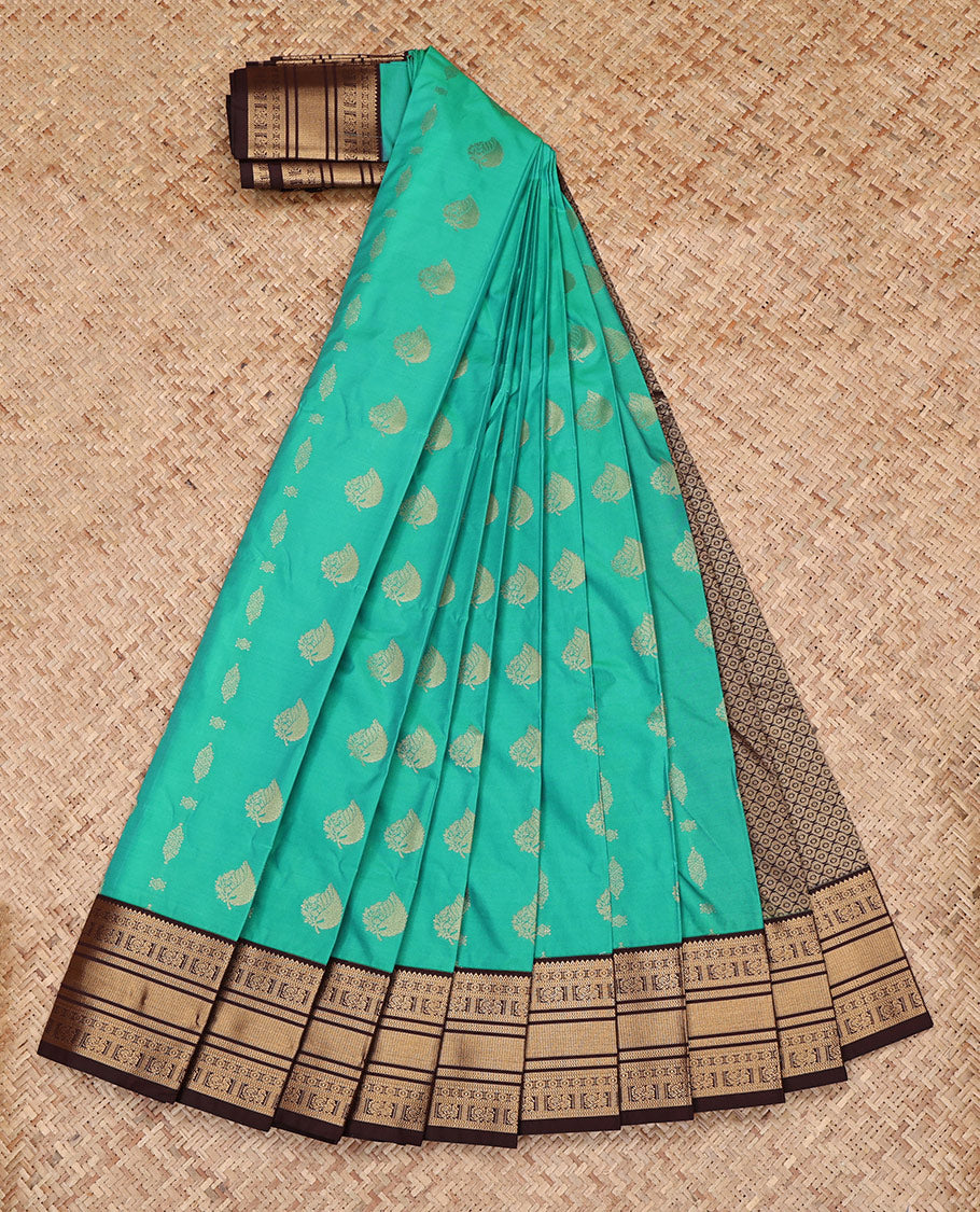 Green Budget Silk Saree, Spotlighted with Leaf Zari Buttas All Over Its Body, Complemented by a Contrast Traditional Zari Design Border, Grand Pallu, and Paired with a Contrast Blouse
