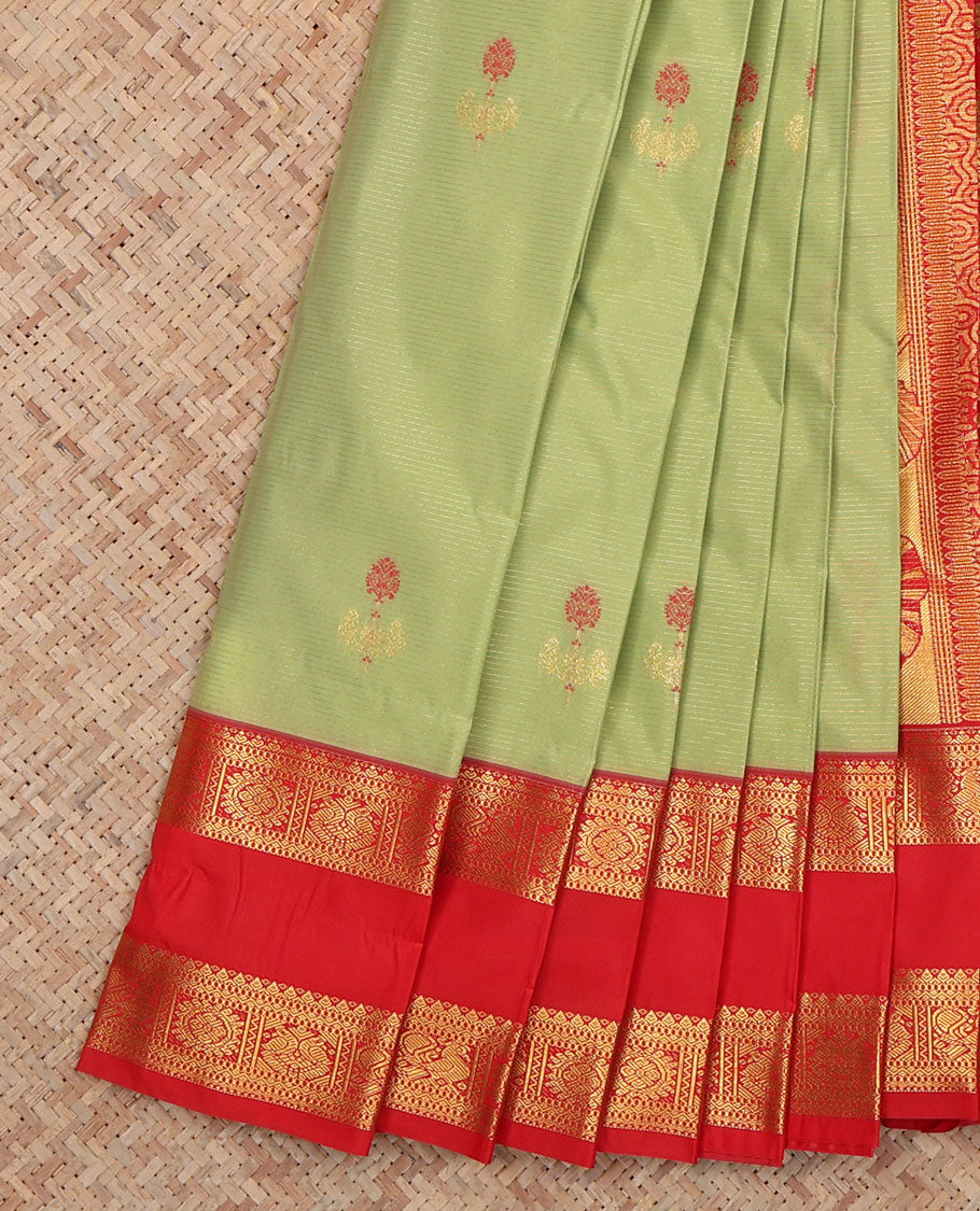 Green Budget Silk Saree, Enriched with Stripes and Floral Buttas, a Contrast Rettai Pettu Zari Border, a Grand Pallu and a Contrast Blouse
