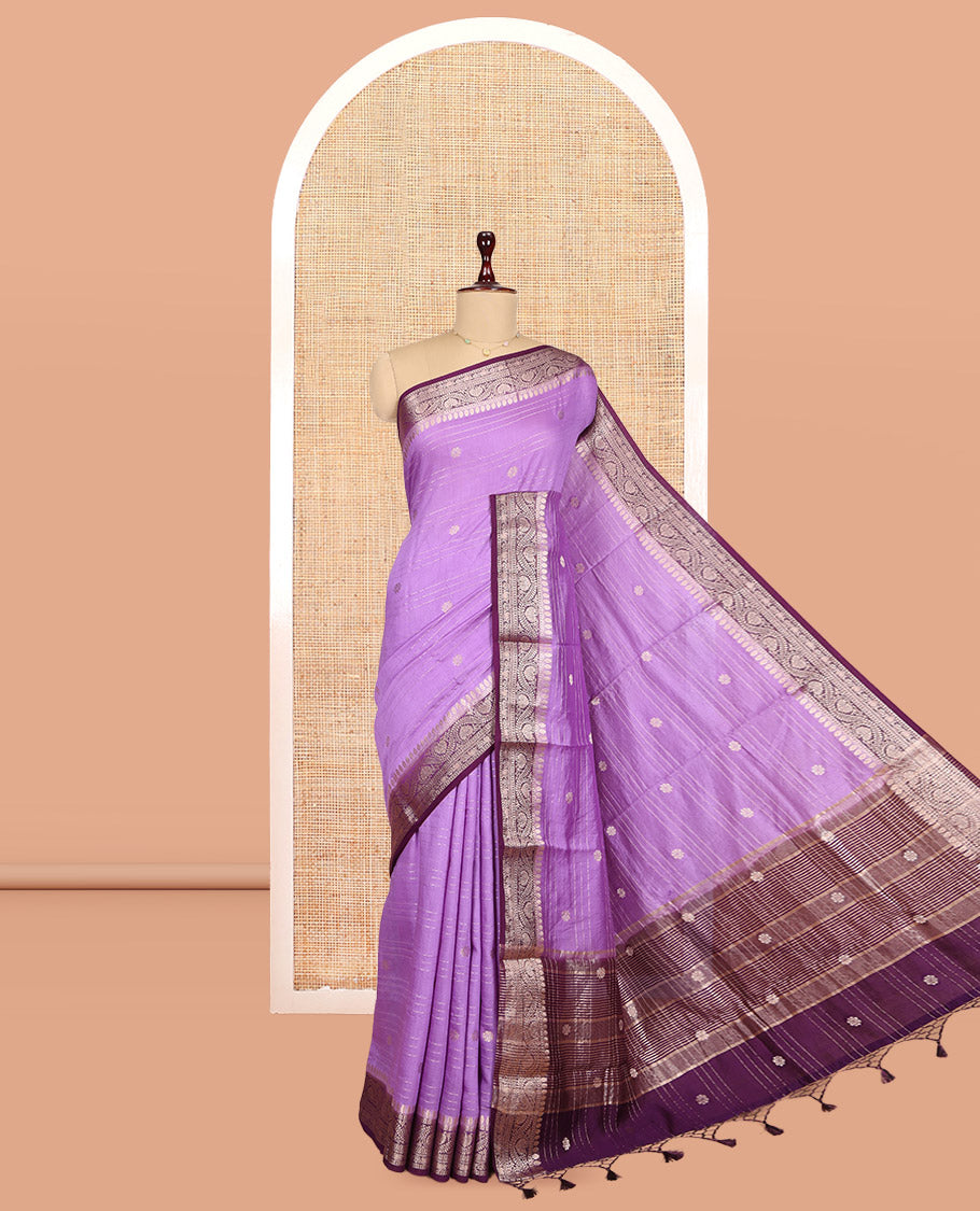 Lavender Assam Silk Saree, Decked Up with Zari Buttas and Stripes, Complemented by Contrast Floral Creeper Zari Border, Zari Woven Pallu, and Contrast Blouse