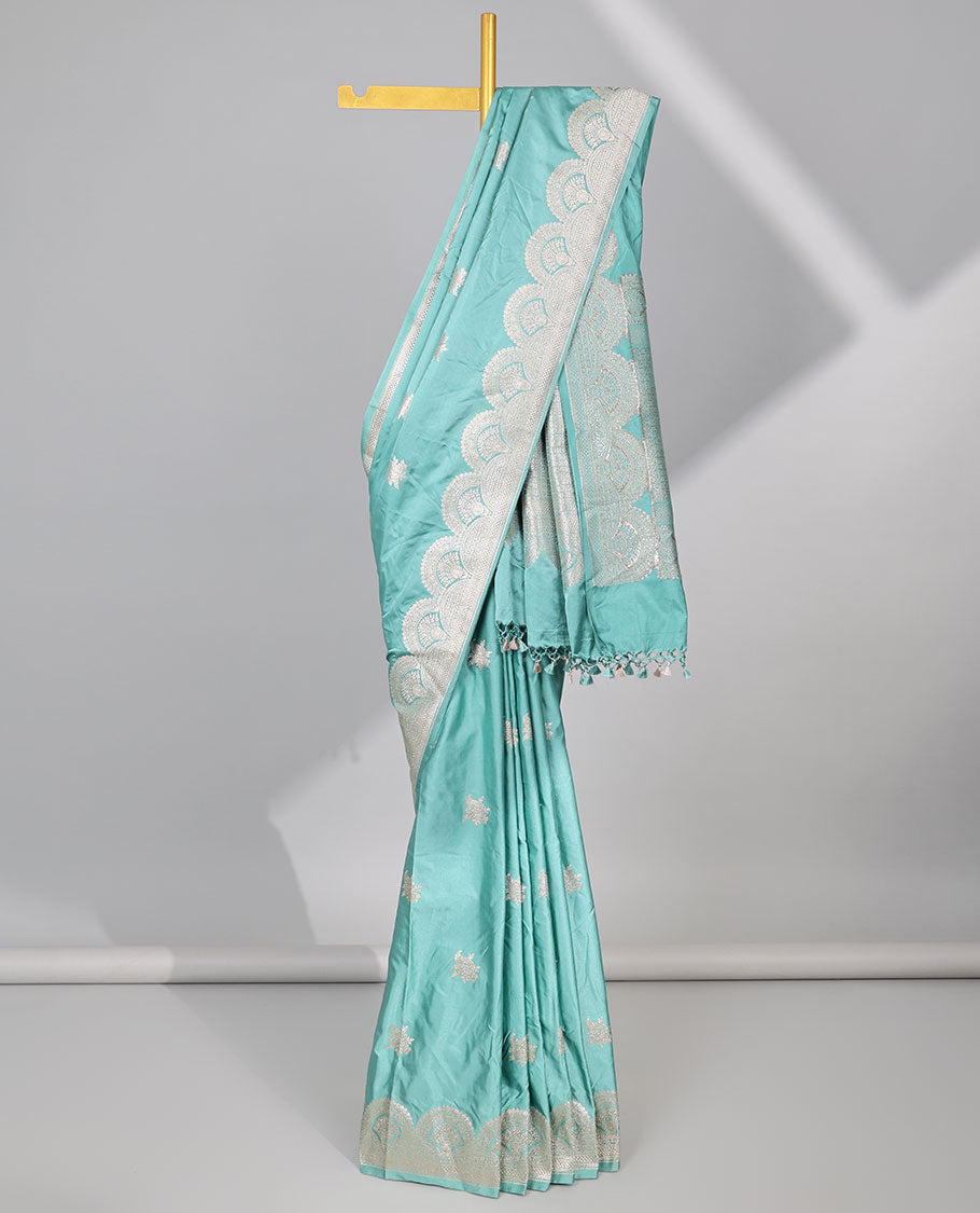 Green motifs satin silk saree with self floral motifs border & intricate zari design pallu