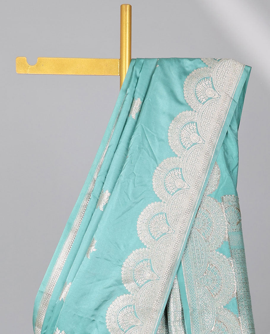 Green motifs satin silk saree with self floral motifs border & intricate zari design pallu