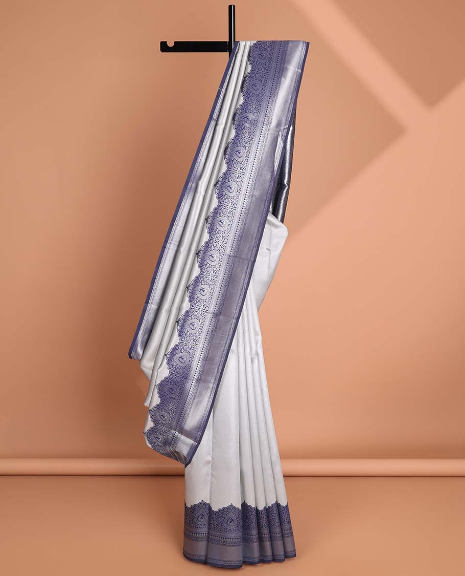 Grey checked design litchi silk saree with contrast floral design border & leaf vine design pallu