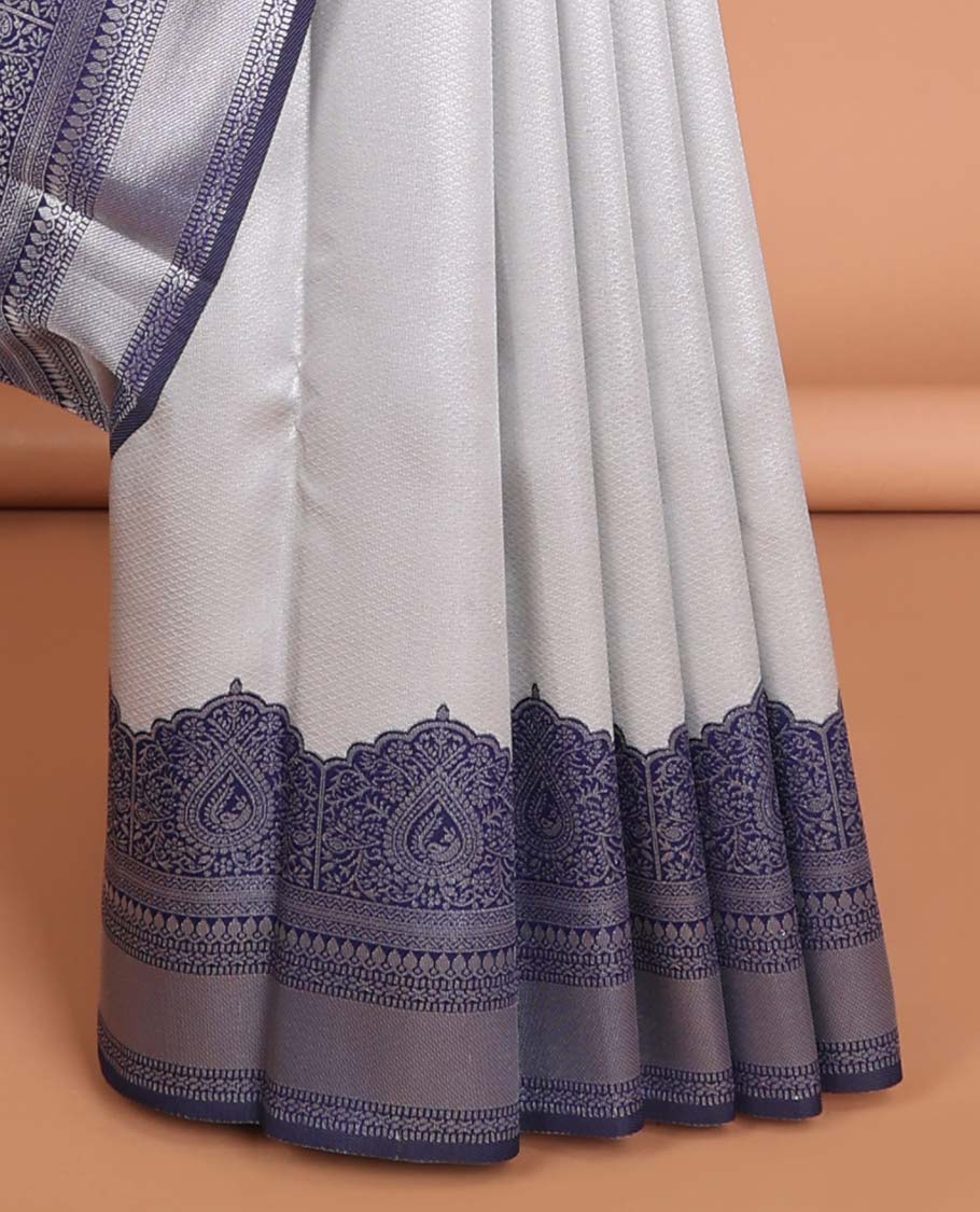 Grey checked design litchi silk saree with contrast floral design border & leaf vine design pallu