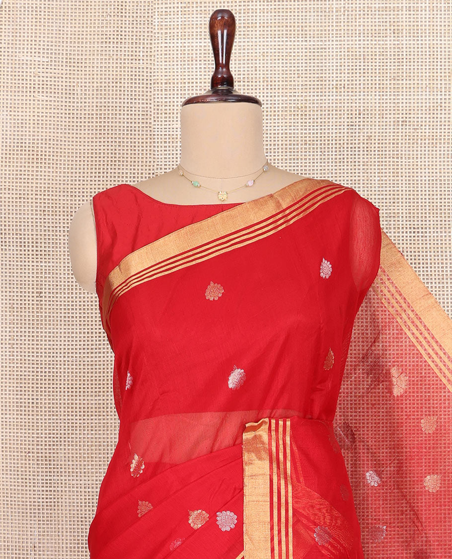 Red Chanderi Cotton Saree, Accentuated with Zari Buttas All Over Its Body, Highlighted by Zari Border, Pallu Steeped with Zari Stripes, and Paired with a Matching Blouse