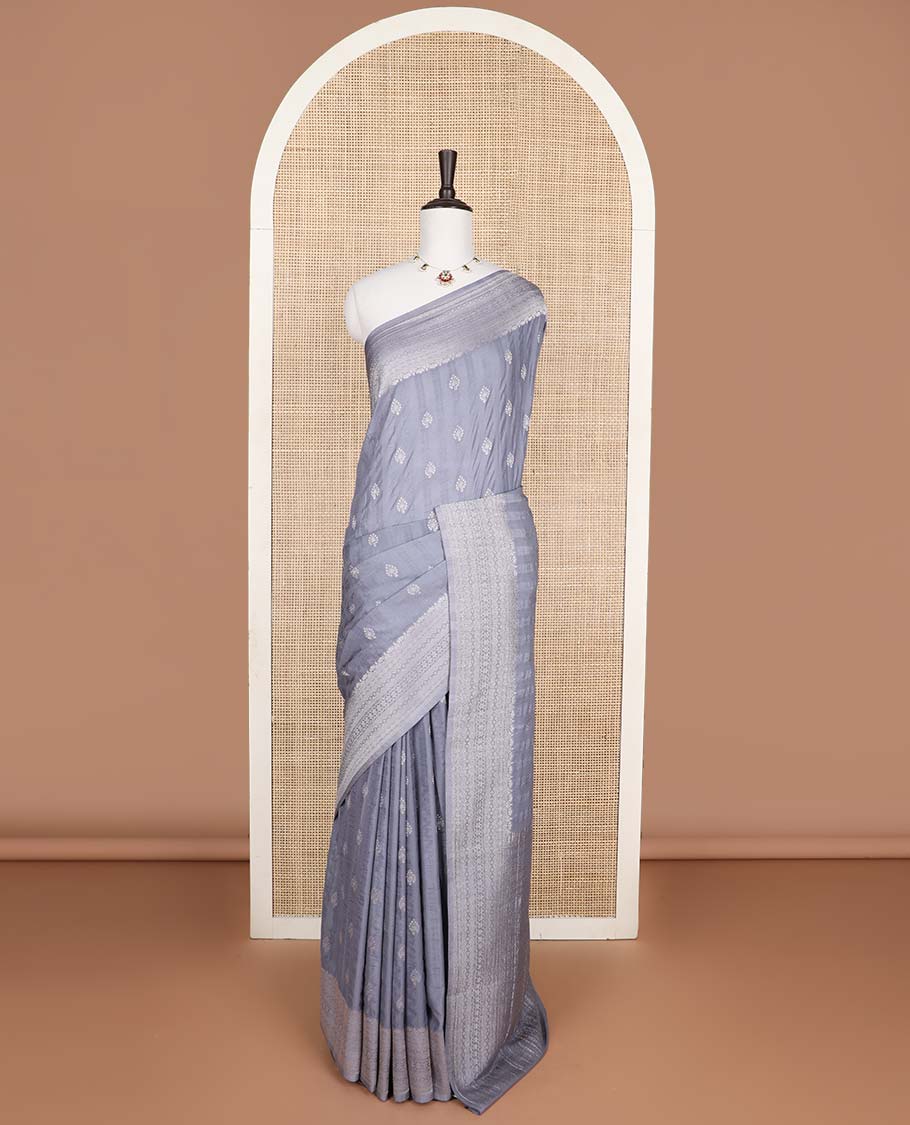 Grey floral motifs fancy crepe saree with self intricate zari design border & floral design pallu