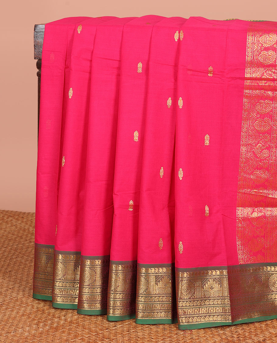 Pink Chettinad Cotton Saree Accentuated with Zari Buttas All Over Its Body, Complemented by a Contrast Border of Traditional Zari Designs, and Pallu Features Floral Creeper and Jaal Design