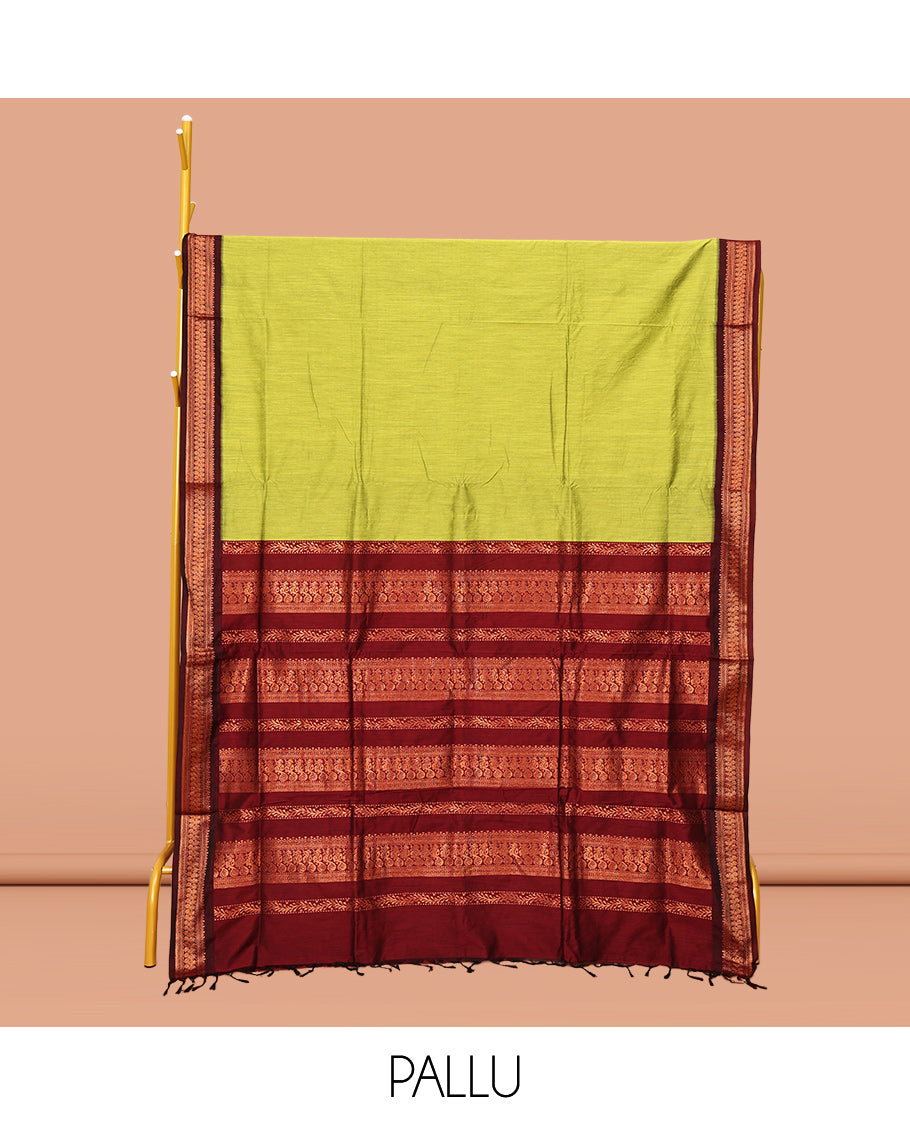 Green Plain Kalyani Cotton Saree, Complemented by a Contrast Traditional Zari Design Border, Pallu Features Traditional Zari Designs, and Paired with a Contrast Blouse