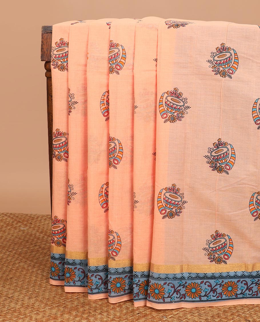 Orange musical instruments printed Chirala cotton saree, contrast floral creeper printed border, and striped pallu