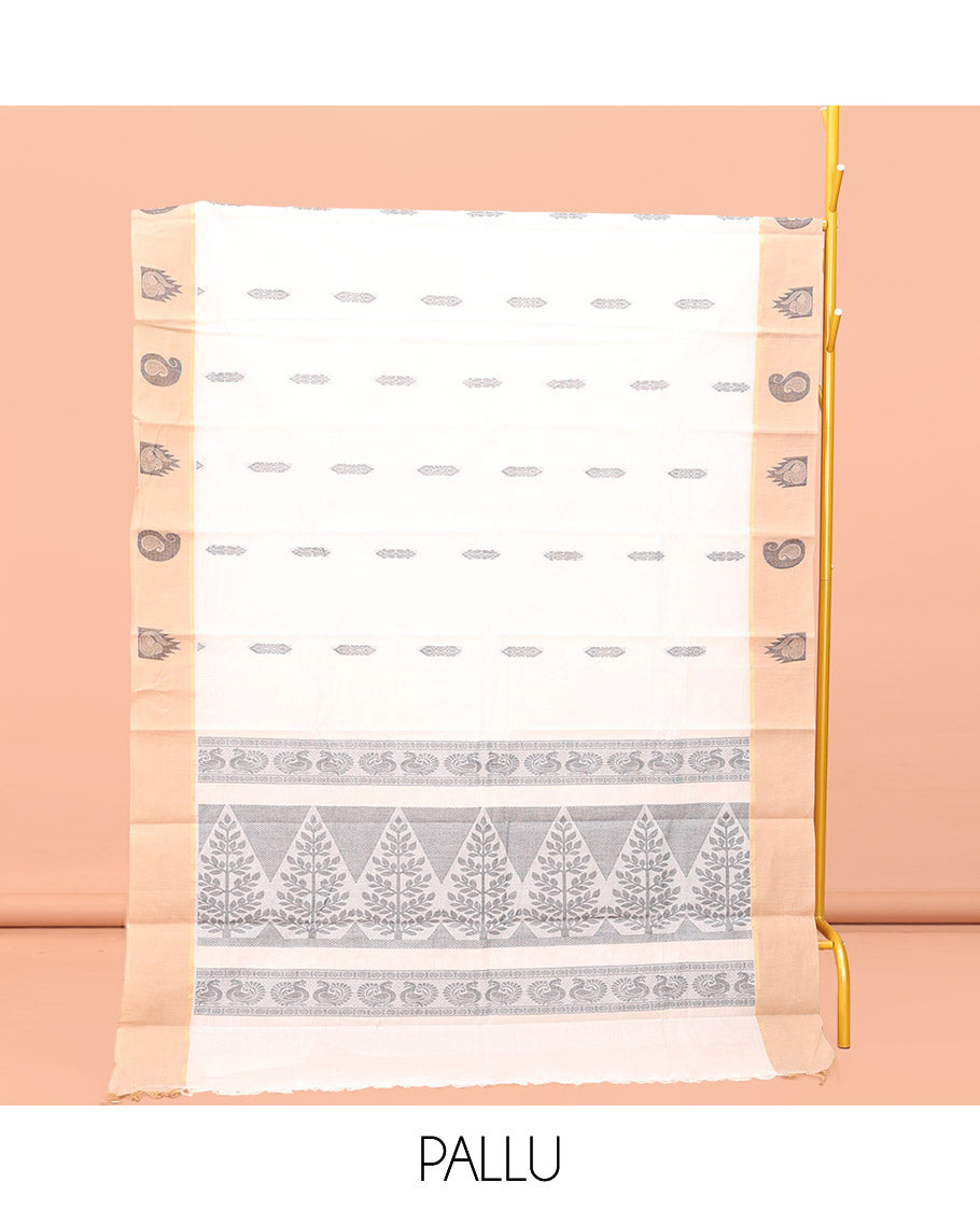 White Kanchi Cotton Saree, Crafted with Buttas All Over Its Body, a Complemented by Contrast Temple Border, Pallu of Tree Designs, and Paired with a Matching Blouse
